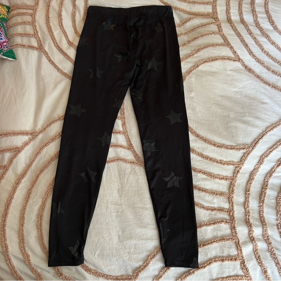 Ardene NWOT black leggings with metallic black stars - Picture 2 of 5